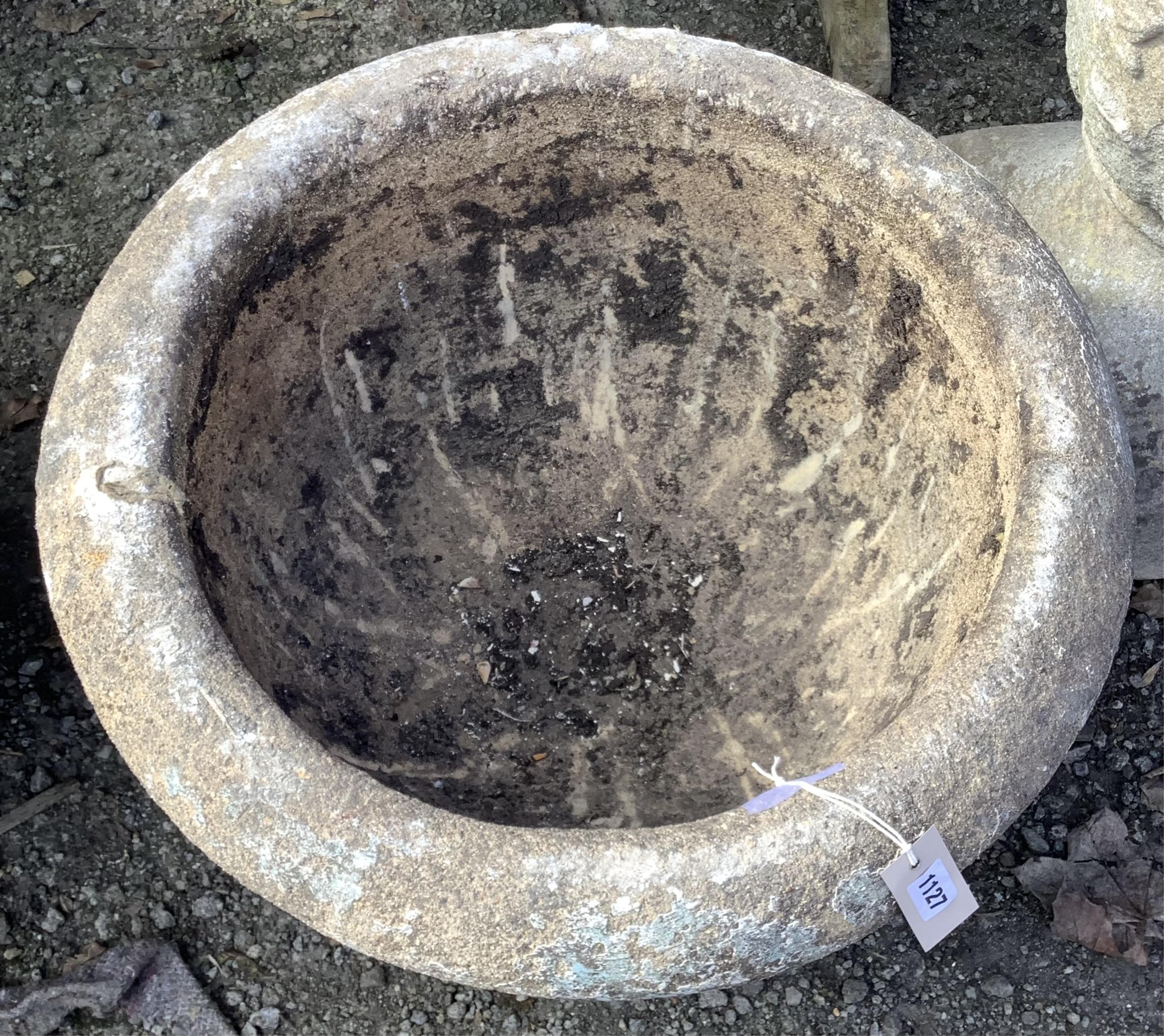 A pair of composition stone planters, diameter 60cm, height 42cm. Condition - fair